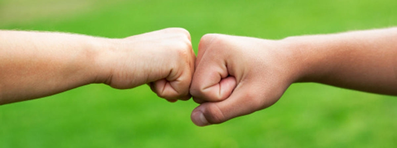 College madness: A “fist bump” is sexual harassment