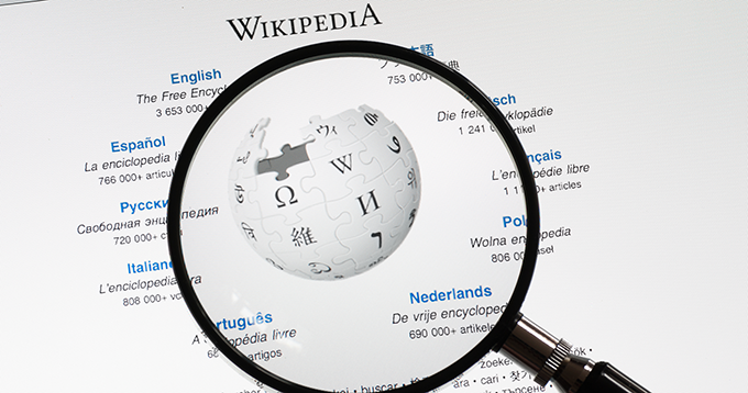 Yes, you can (and should) use Wikipedia at university