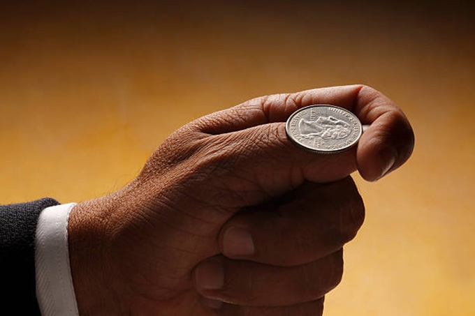 Heads vs tails? A simple coin flip can be enough to change how we treat others