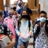 Who has the power to say kids do or don’t have to wear masks in school – the governor or the school district? It’s not clear
