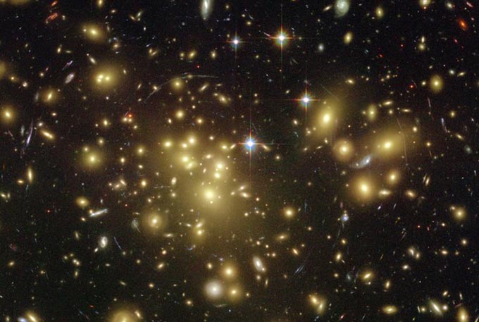  Could supersymmetry one day crack the mystery of all the dark matter lurking in galaxy clusters? NASA/wikimedia 