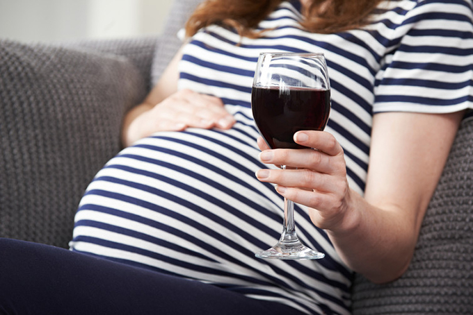 It’s safest not to drink at all while pregnant. from www.shutterstock.com