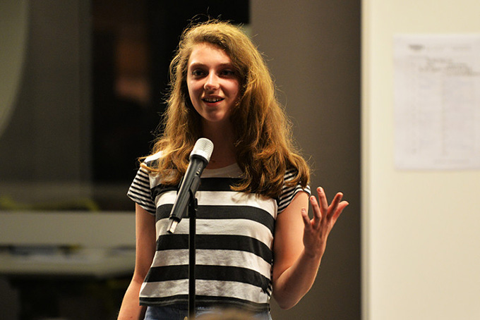 15-year-old Chloe Humphrys performs her poem ‘Youth’ at a slam poetry competition. Blue Mountains Library / flickr,