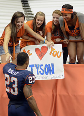  Many college football players are adored – almost worshipped – by their peers. AP Photo/Heather Ainsworth 
